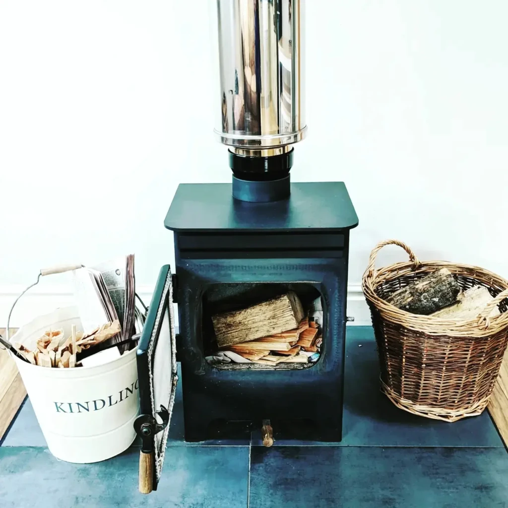 Log Burner ready with logs and kindling